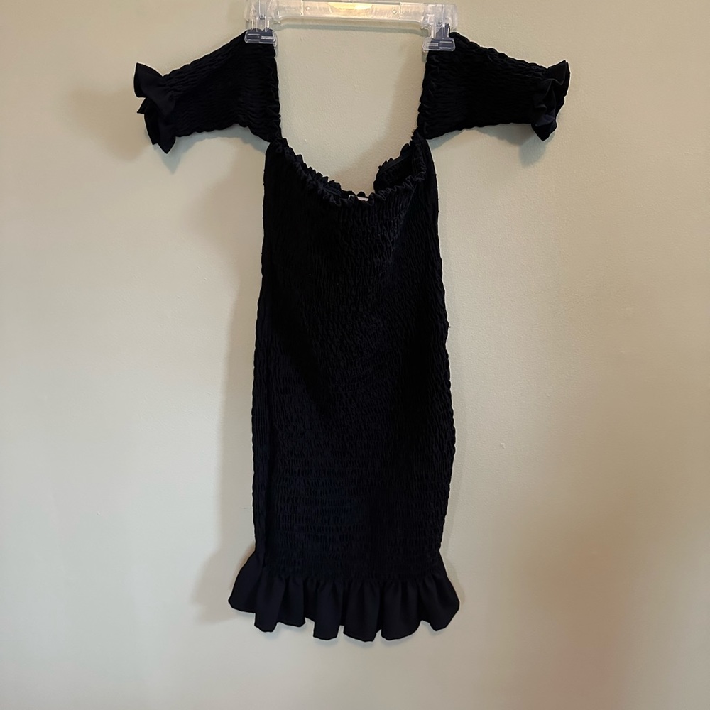 Black strapless tight dress with sleeve design, never worn